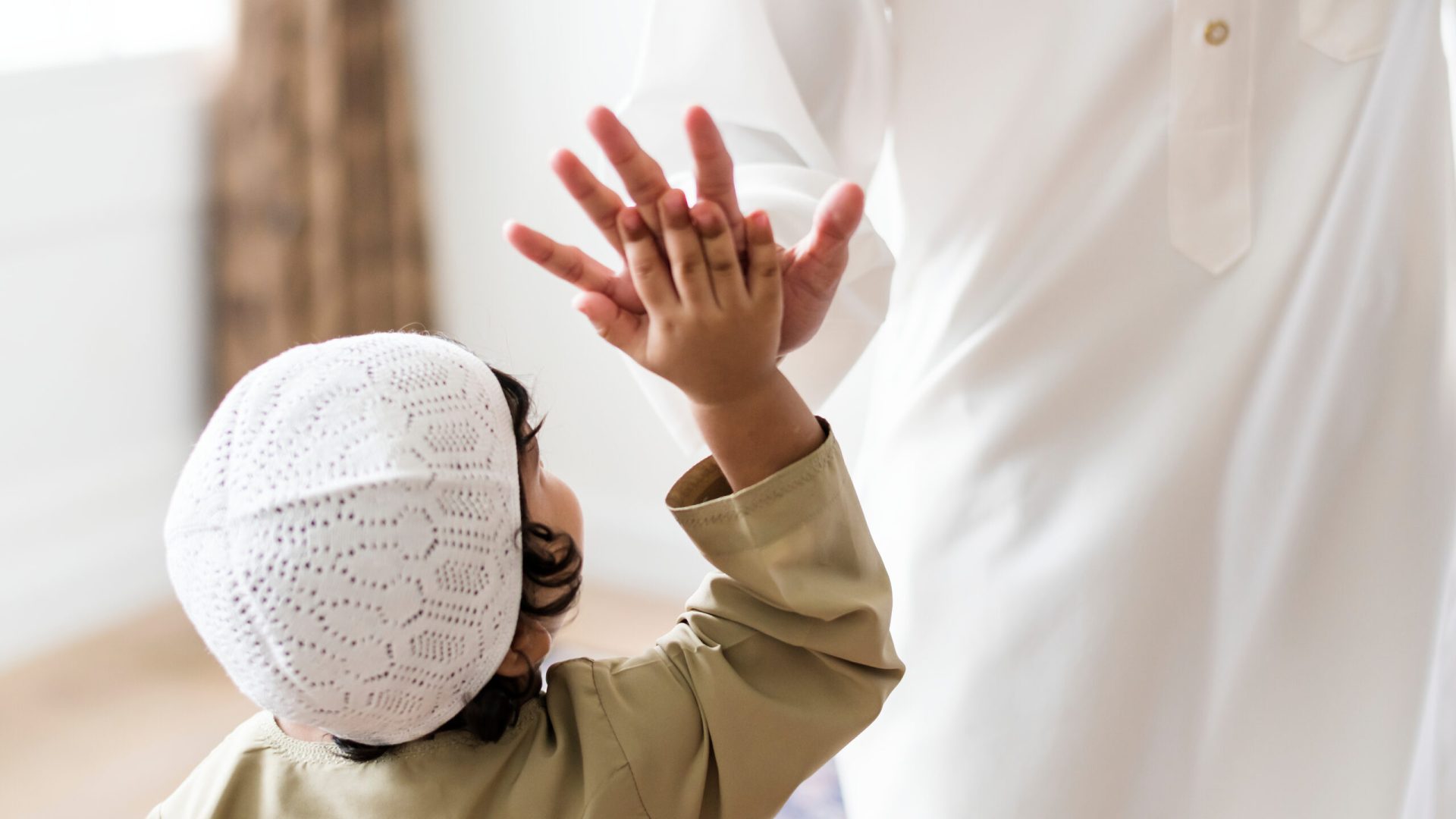 Muslim,Boy,Giving,A,High,Five