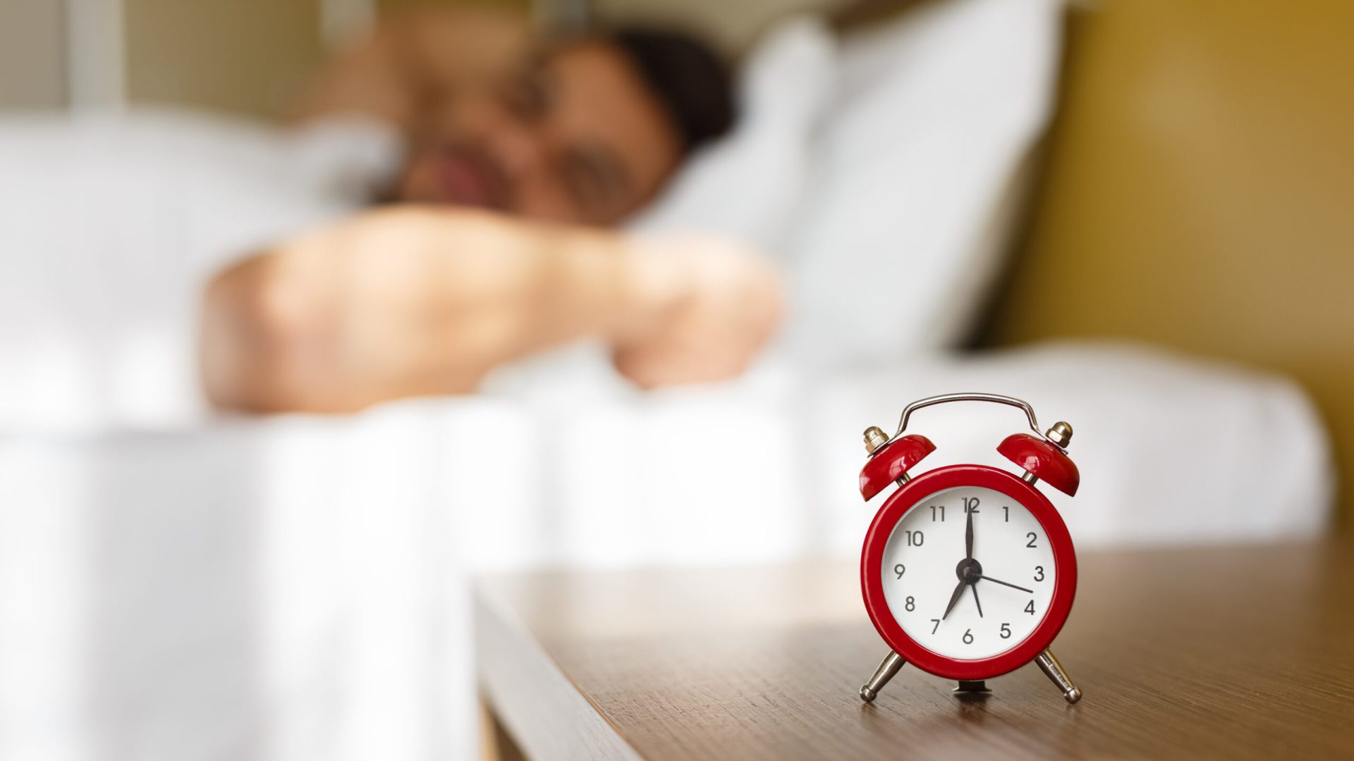 Alarm,Clock,On,Bedside,,Arab,Man,Waking,Up,Fully,Rested